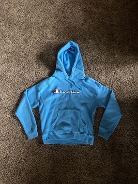 Champion Light Blue Hooded Sweatshirt with Script Logo